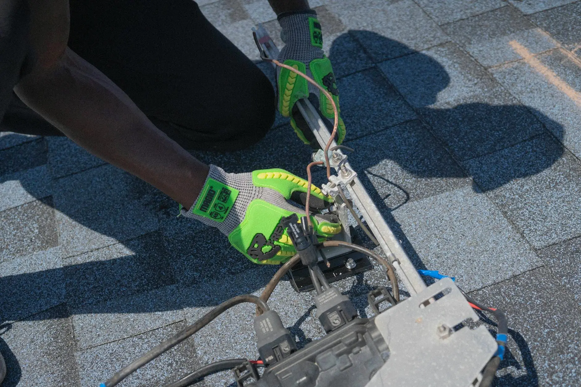 A close-up of high-quality architectural shingles showing the clean lines and professional installation work of our team.