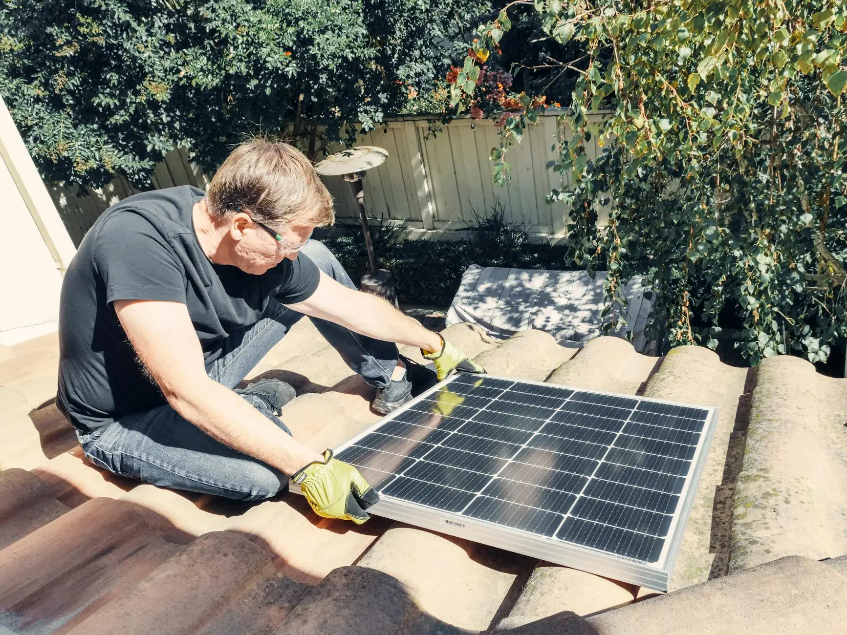A professional roofing crew installing high-quality asphalt shingles on a residential roof in Layton, Utah.